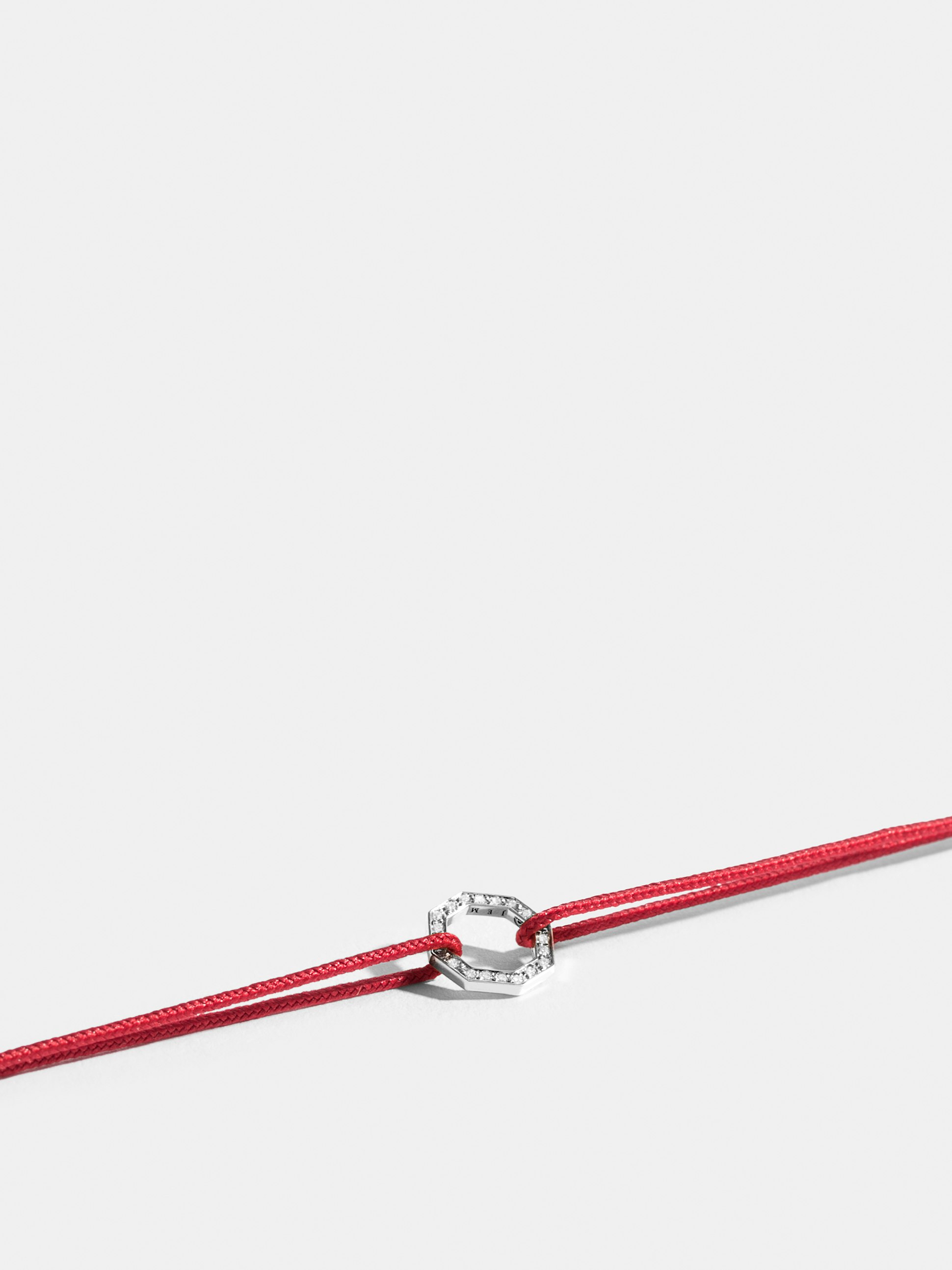 Octogone motif in 18k Fairmined ethical white gold, paved with lab-grown diamonds, on a poppy red cord.