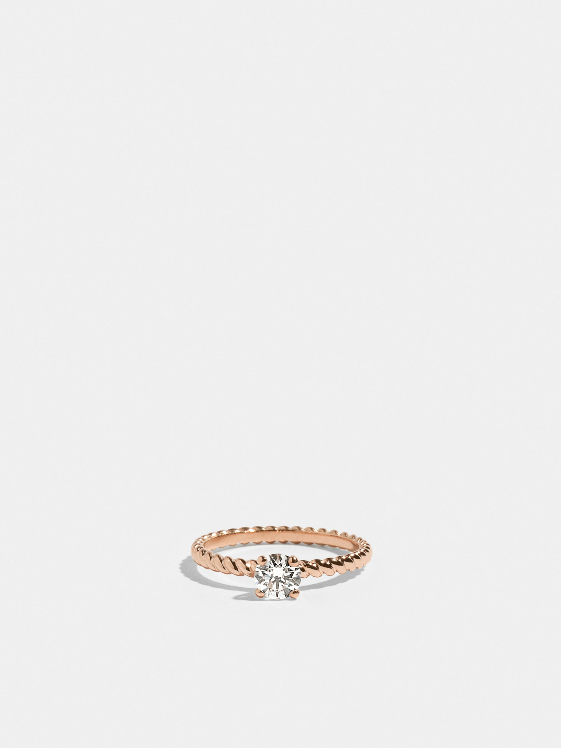 Solitaire Anagramme twisted in rose gold 18k Fairmined ethical set with a 0.50 carat synthetic brilliant cut diamond | JEM Jewellery Ethically Minded