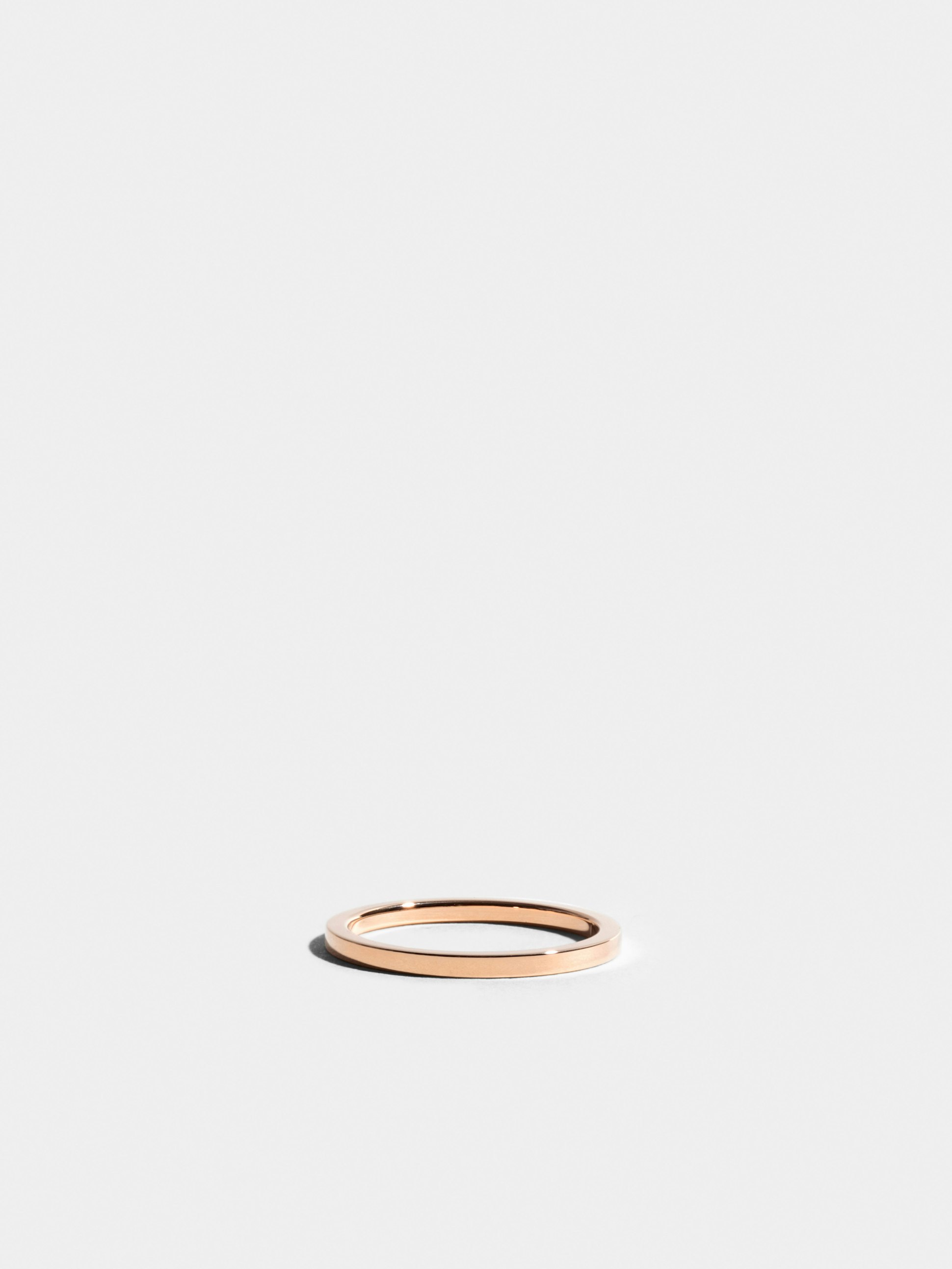 Anagramme flat ribbon ring in 18k Fairmined ethical rose gold