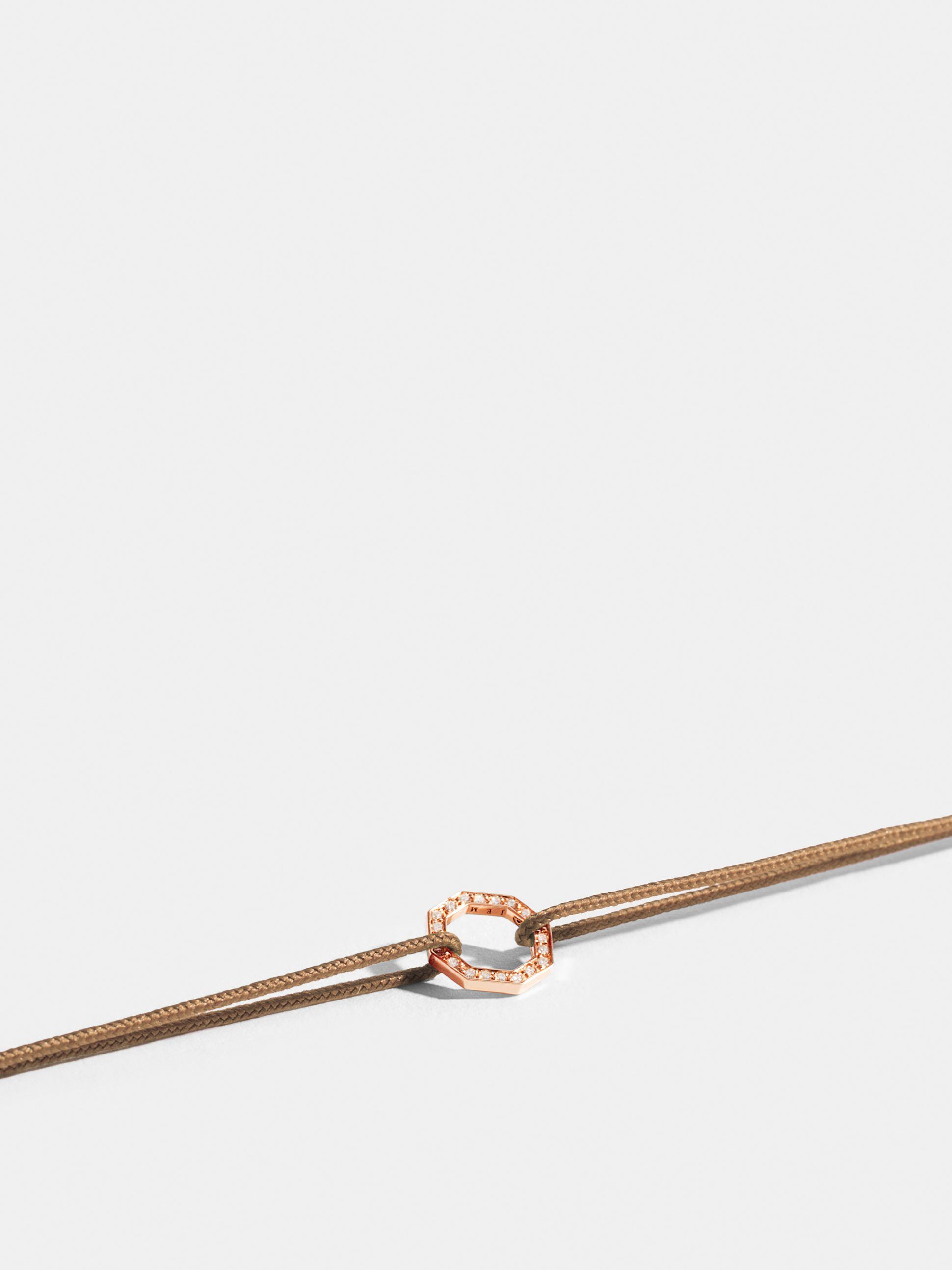 Octogone motif in 18k Fairmined ethical rose gold, paved with lab-grown diamonds, on a honey yellow cord.