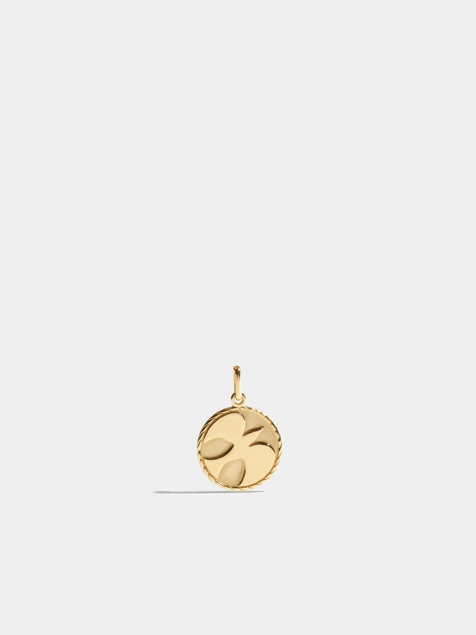 Médaille Colombe en Or jaune éthique 18 carats, certifié Fairmined, vendue avec une chaîne de 45cm.