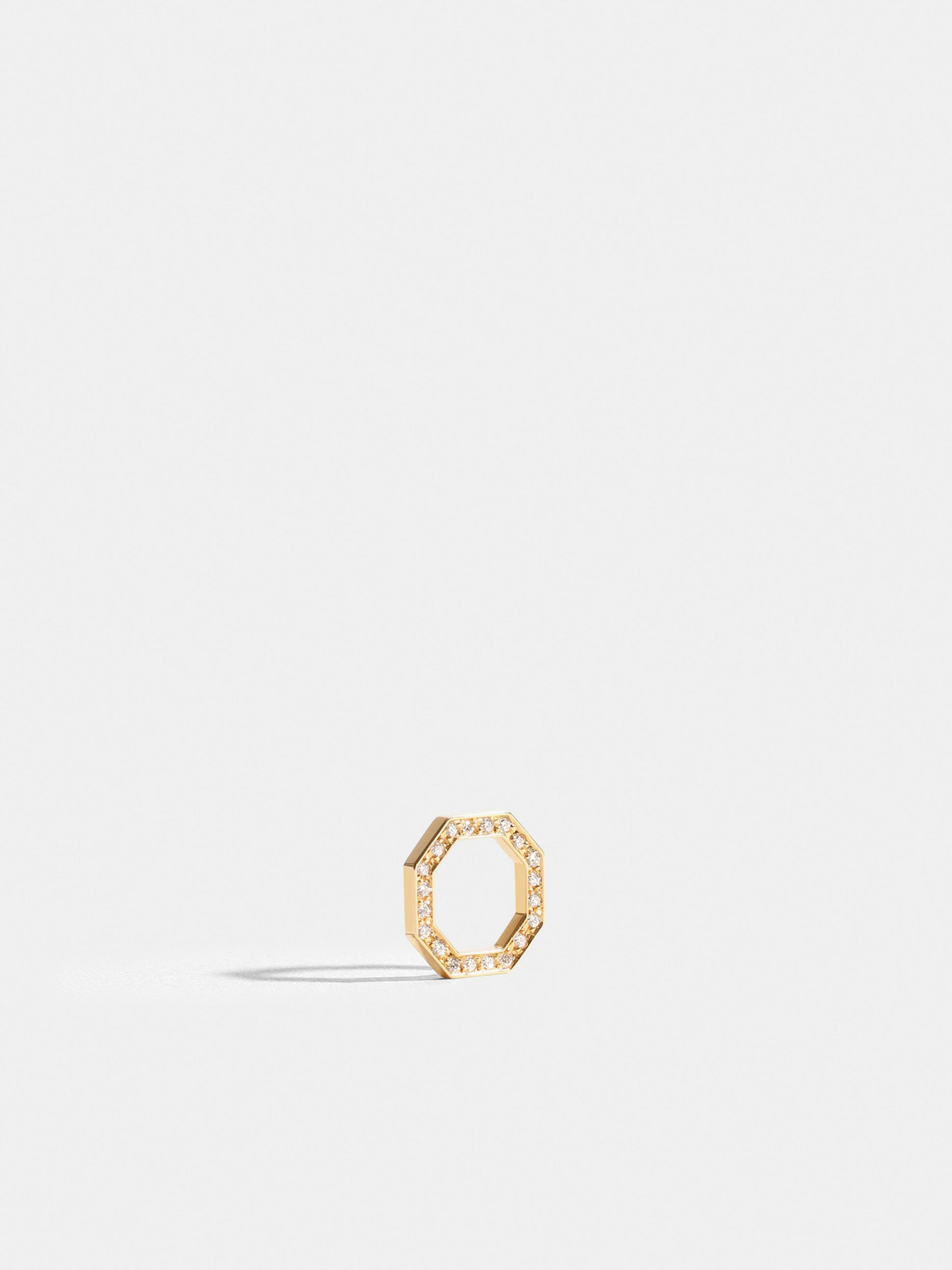 Octogone motif in 18k Fairmined ethical yellow gold, paved with lab-grown diamonds, on a bright orange cord.
