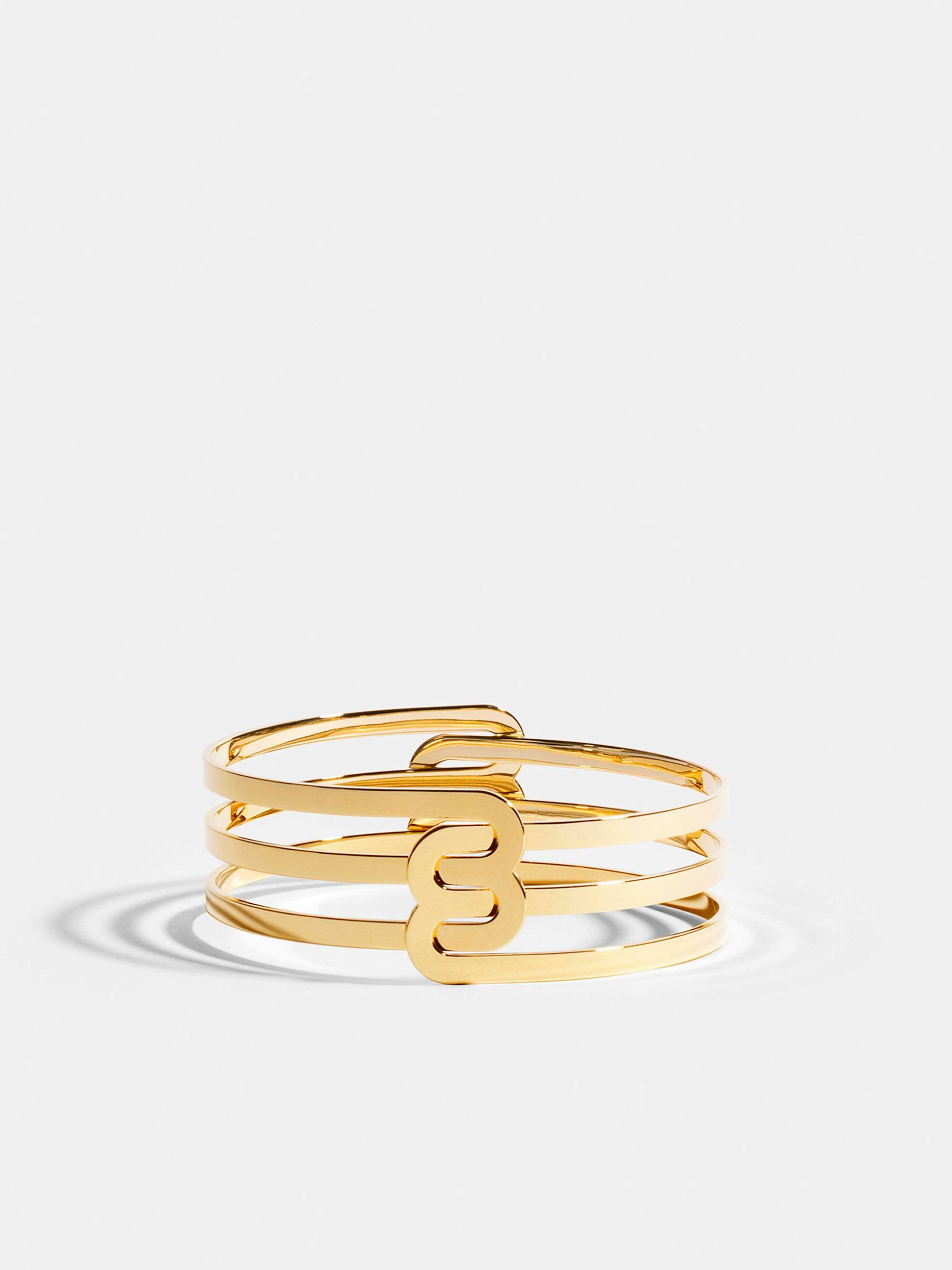 Bracelet Étreintes en Or jaune éthique 18 carats certifié Fairmined composé de deux demi-bracelets doubles finition poli-brillant.