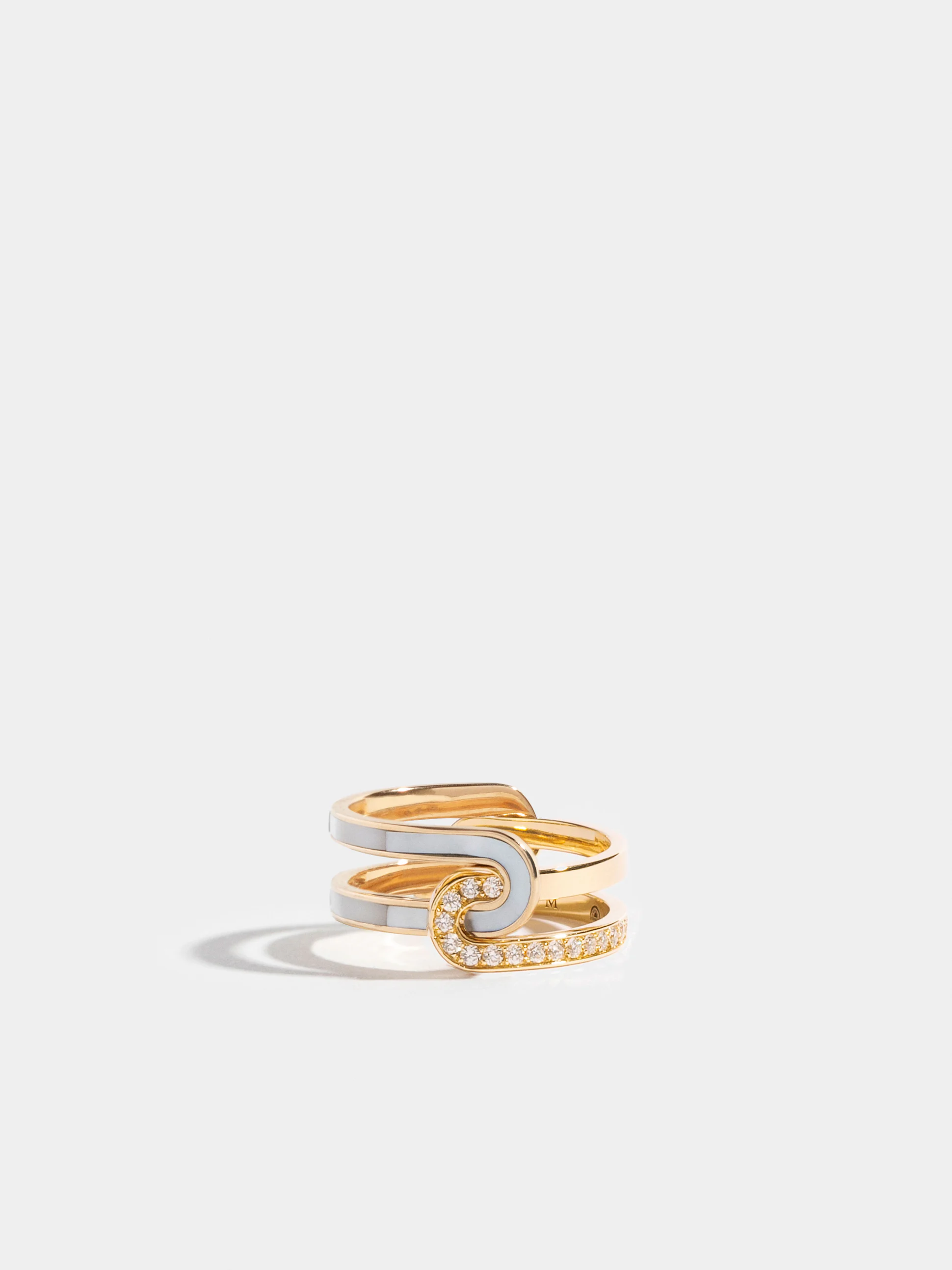 Simple semi-paved and white mother of pearl Etreintes ring