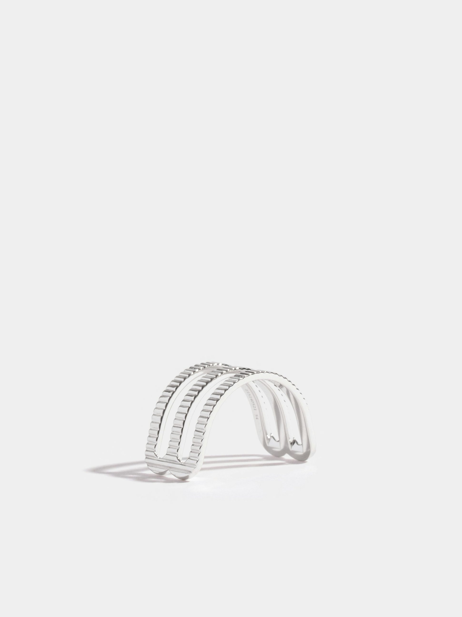 Étreintes double half-ring in 18k Fairmined ethical white gold, with ridges finish.