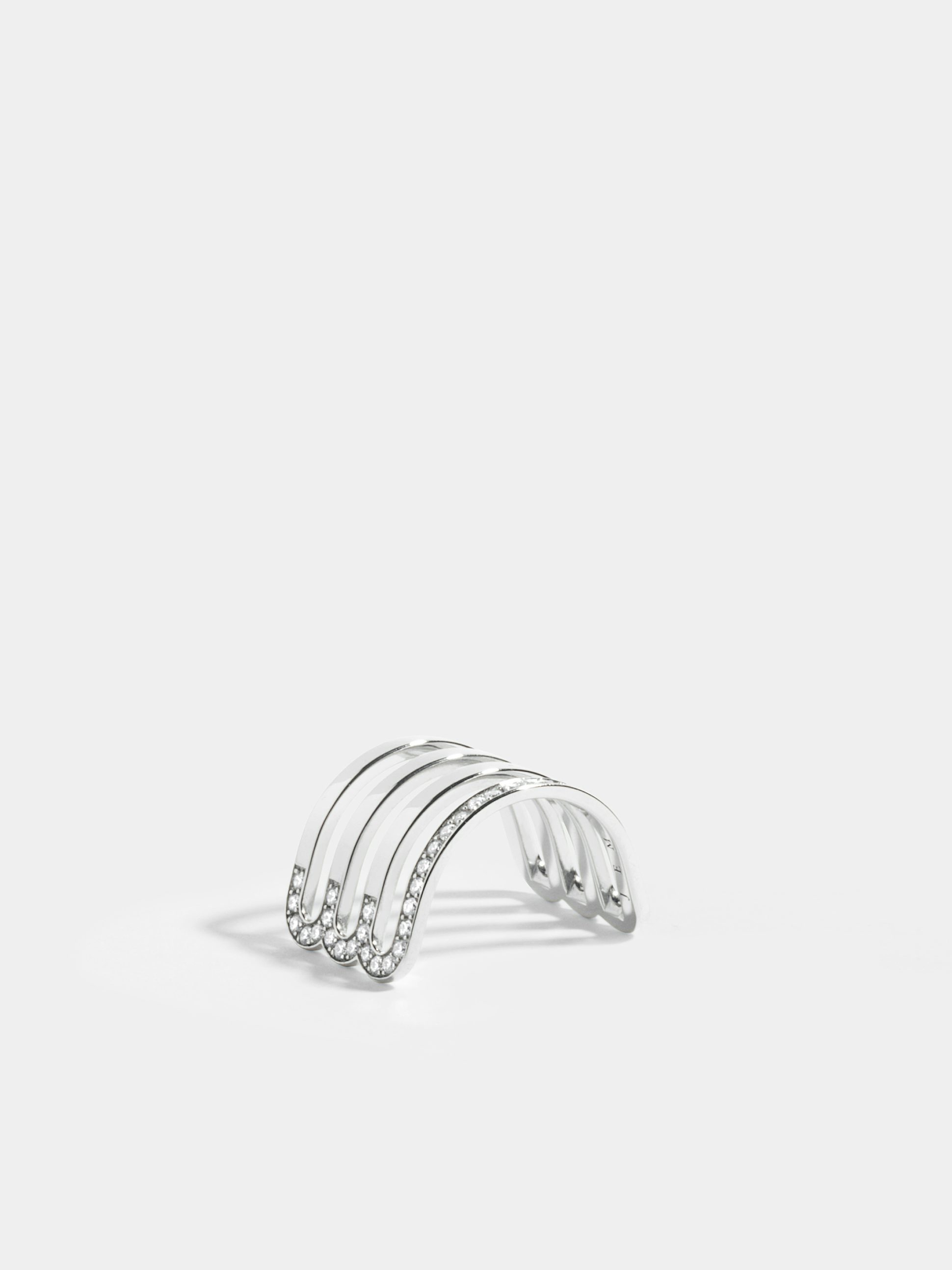 Étreintes triple half-ring in 18k Fairmined ethical white gold, paved with lab-grown diamonds on one line.