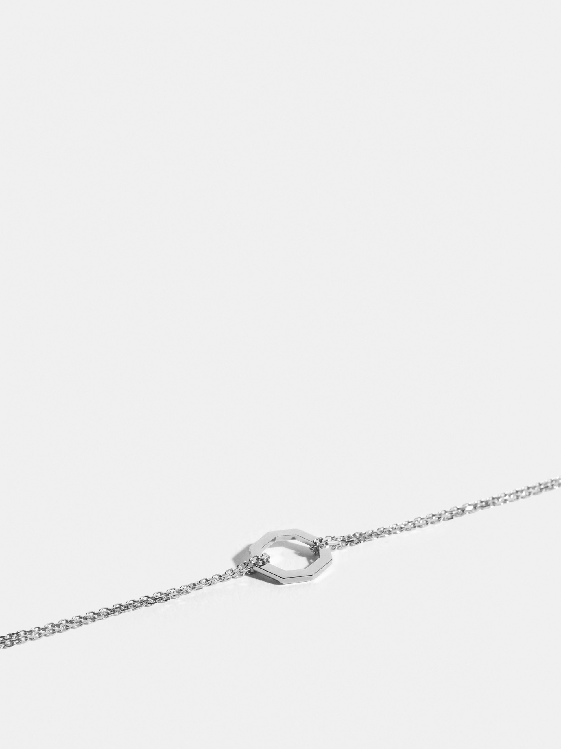 Octogone motif in 18k Fairmined ethical white gold, on a chain.