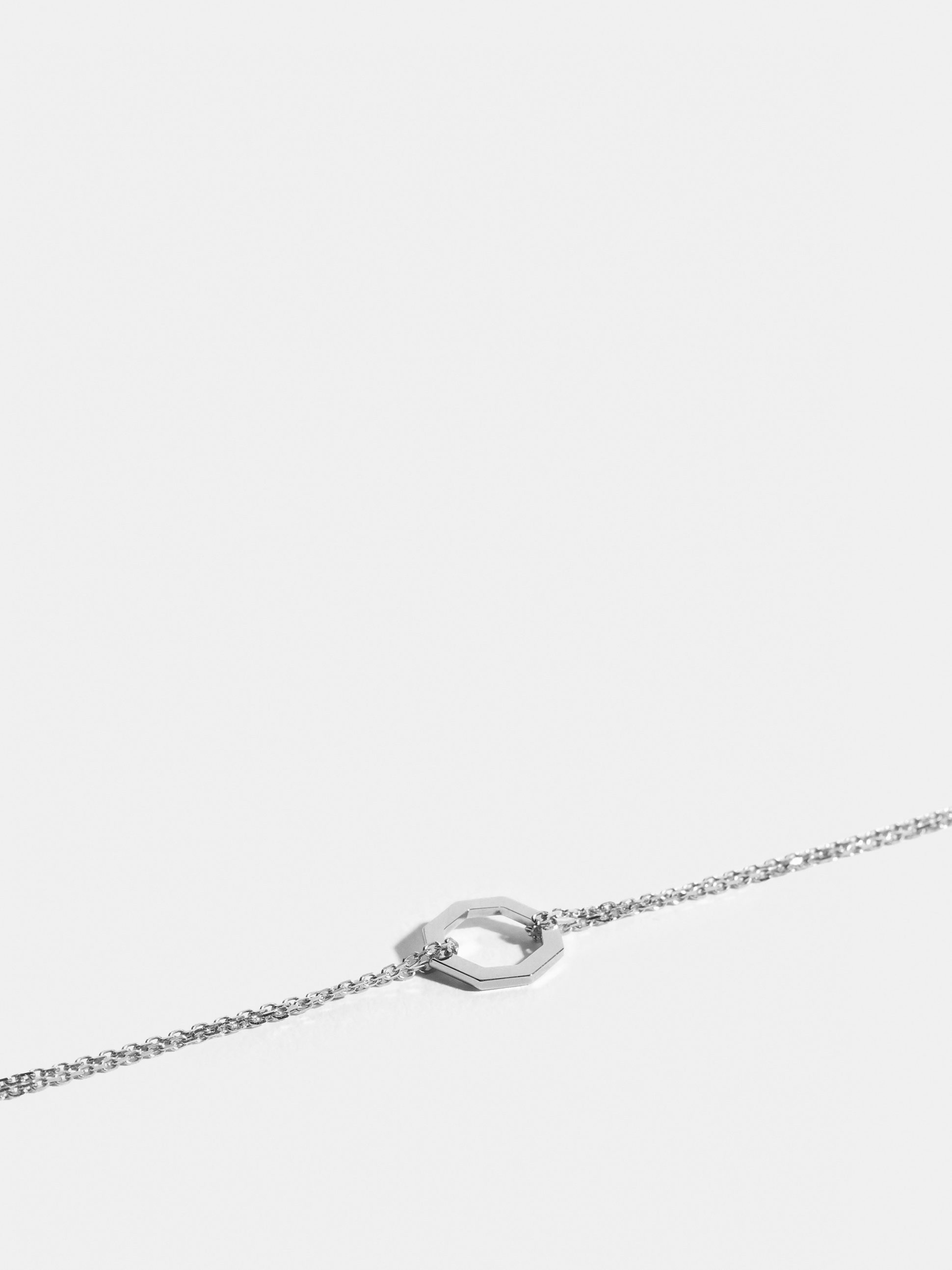 Octogone motif in 18k Fairmined ethical white gold, on a chain.