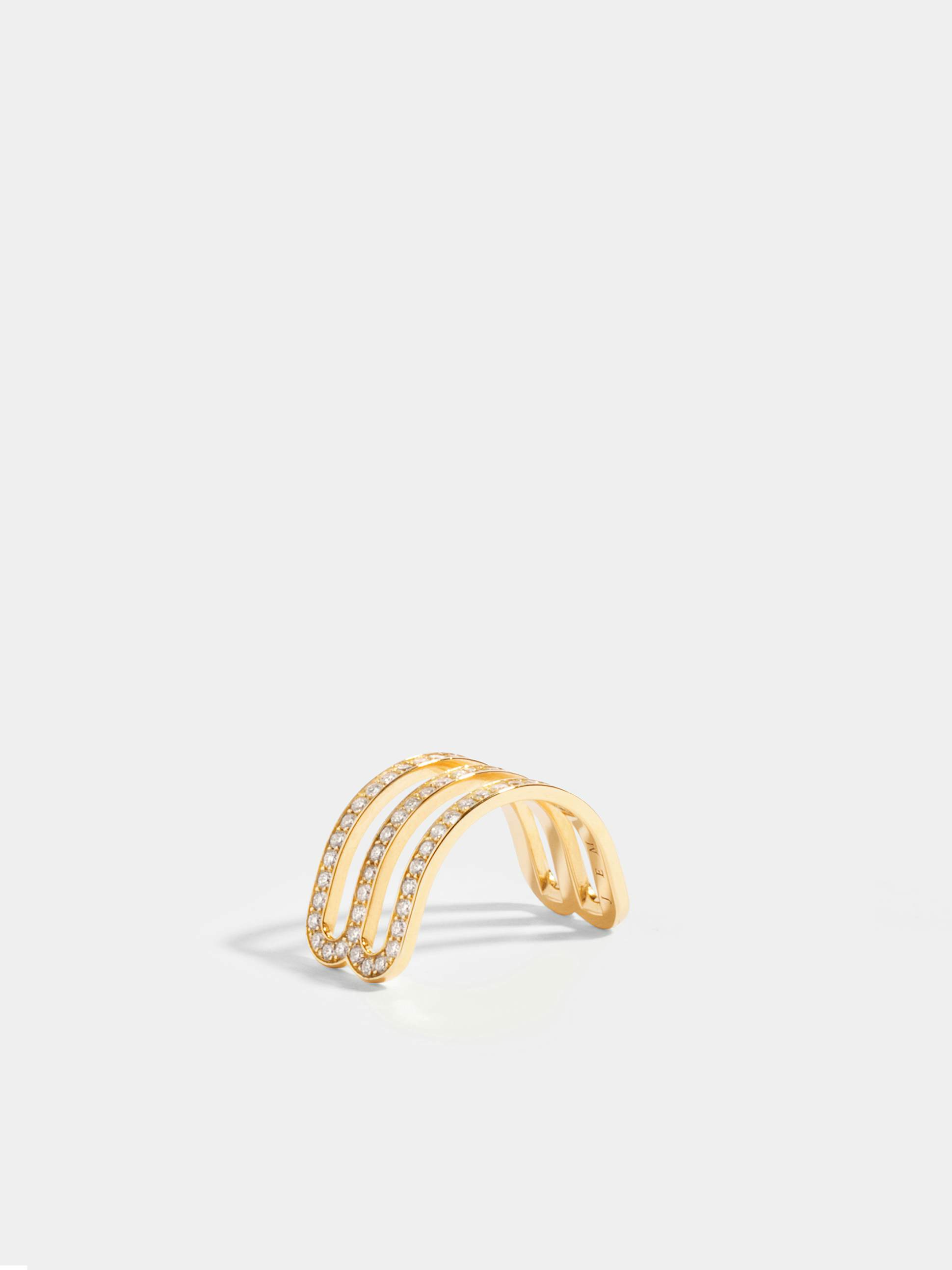 Étreintes double half-ring in 18k Fairmined ethical yellow gold, paved with lab-grown diamonds.