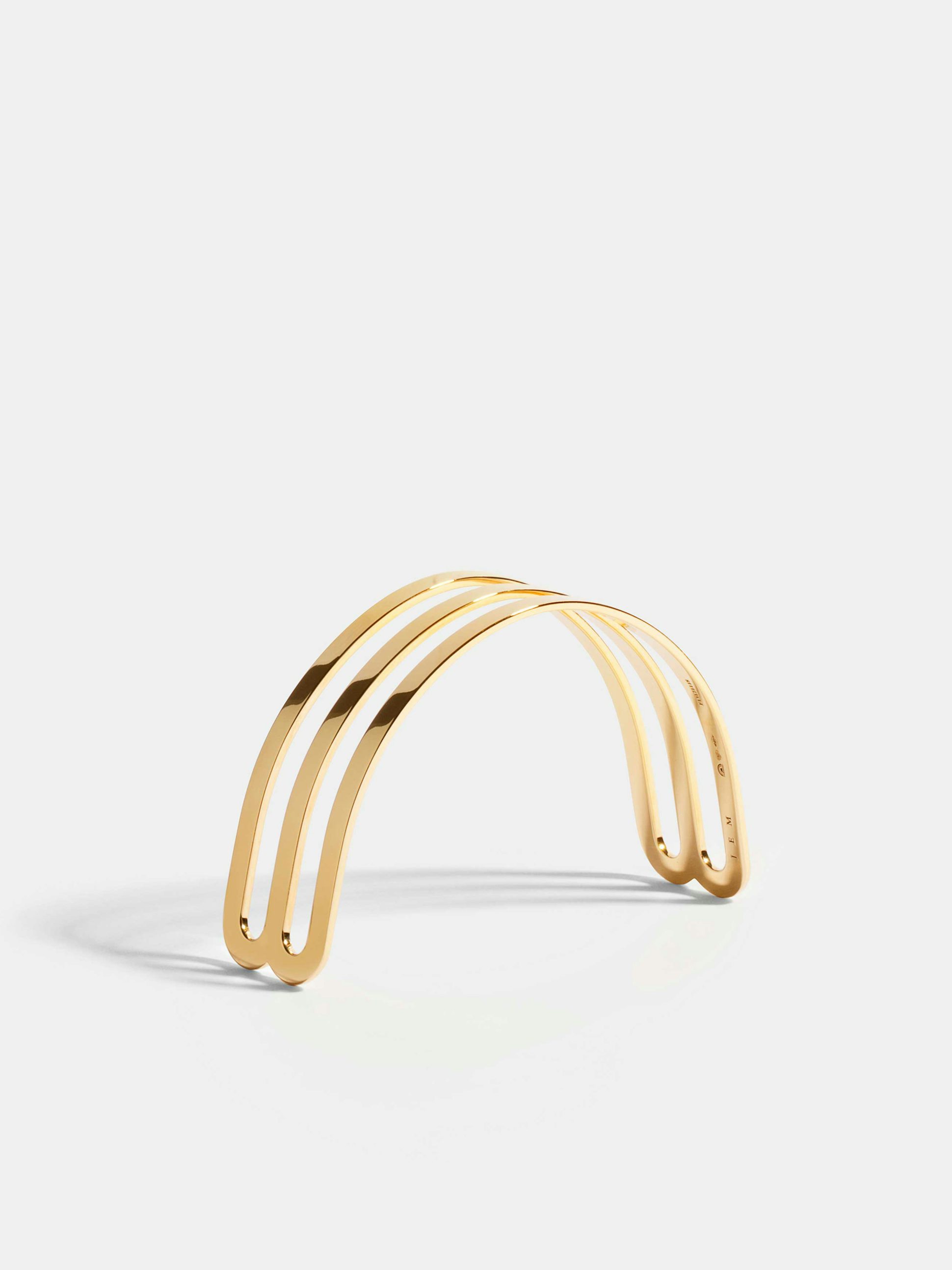 Étreintes double half-bracelet in 18k Fairmined ethical yellow gold with a polished finish.