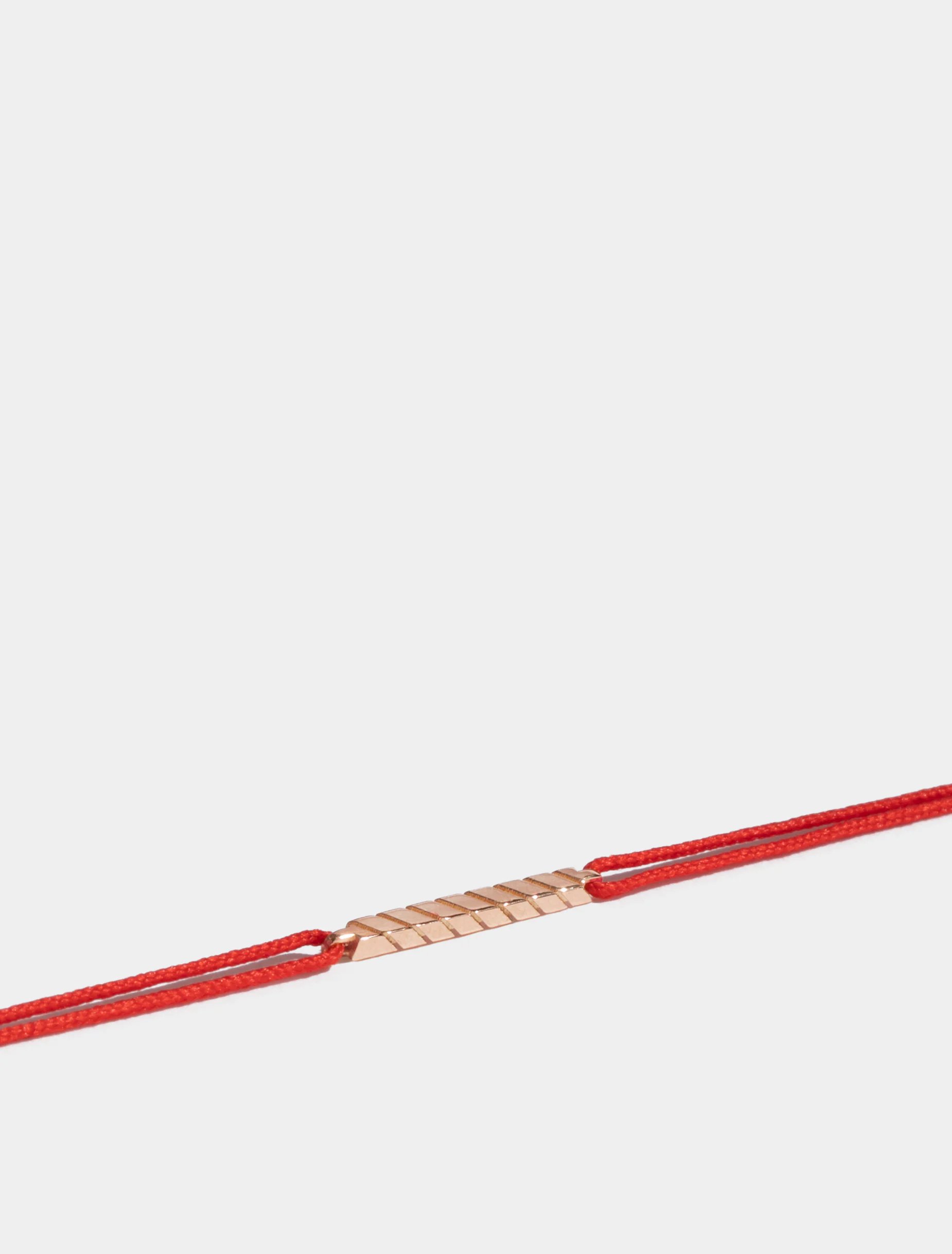 Motif Anagramme rainuré en Or rose éthique 18 carats certifié Fairmined, sur cordon