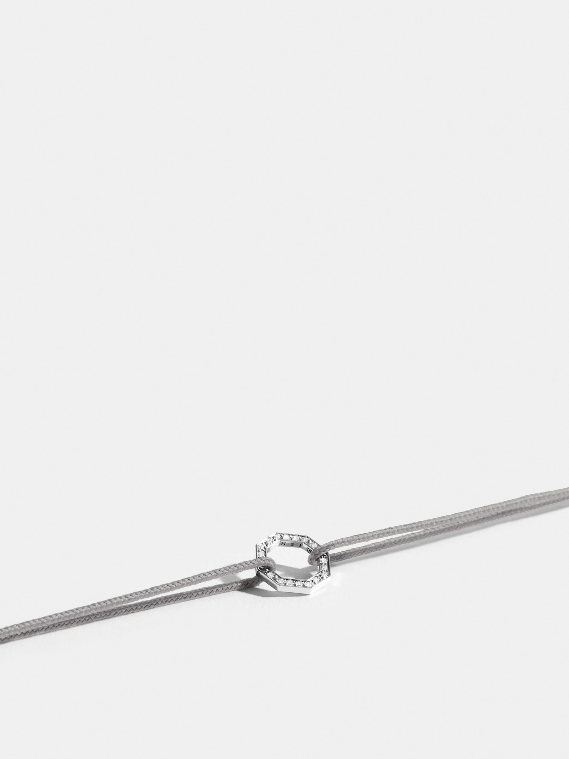Octogone motif in 18k Fairmined ethical yellow gold, paved with lab-grown diamonds, on a pearl grey cord.