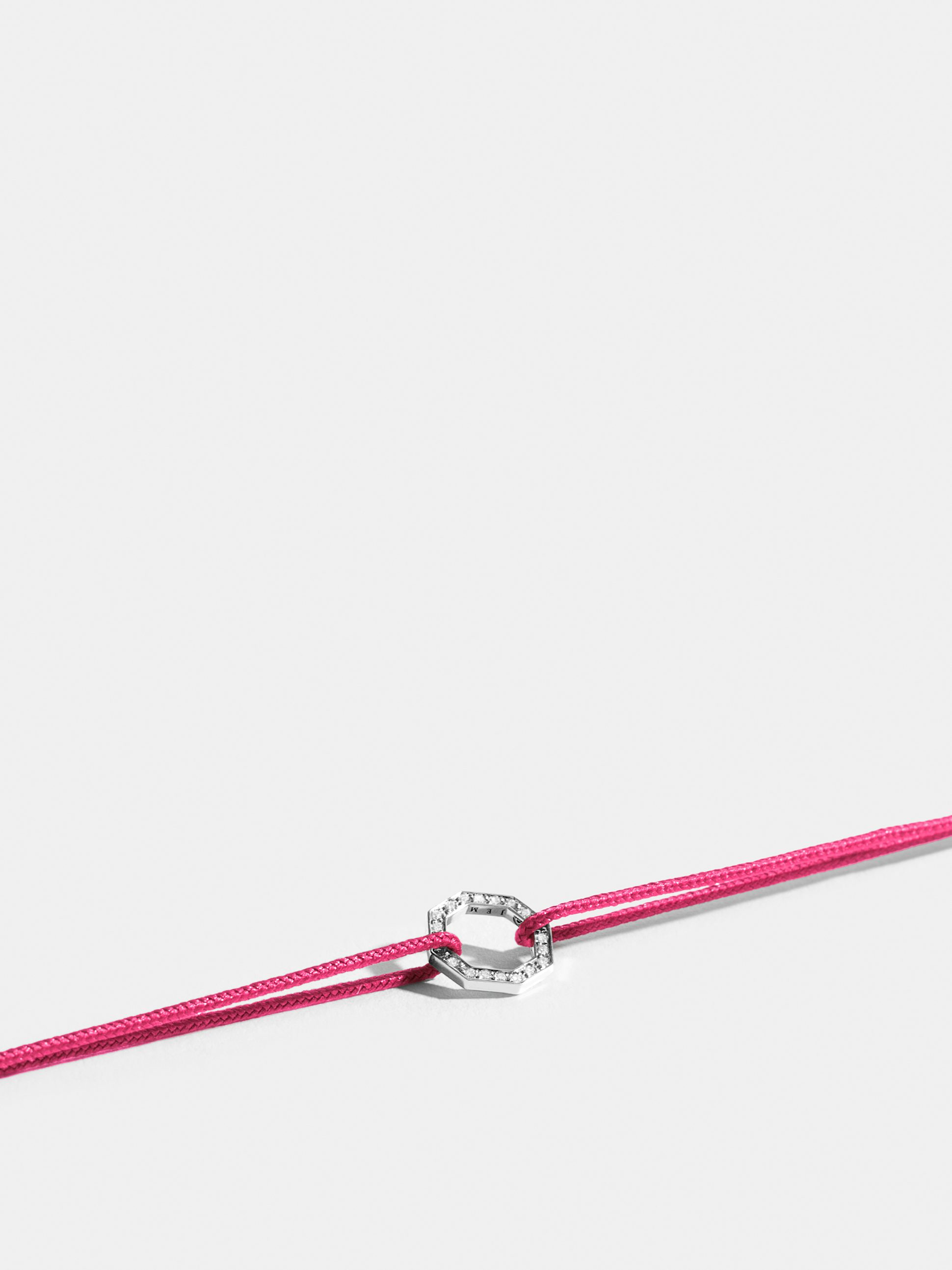 Octogone motif in 18k Fairmined ethical yellow gold, paved with lab-grown diamonds, on a fuschia pink cord.