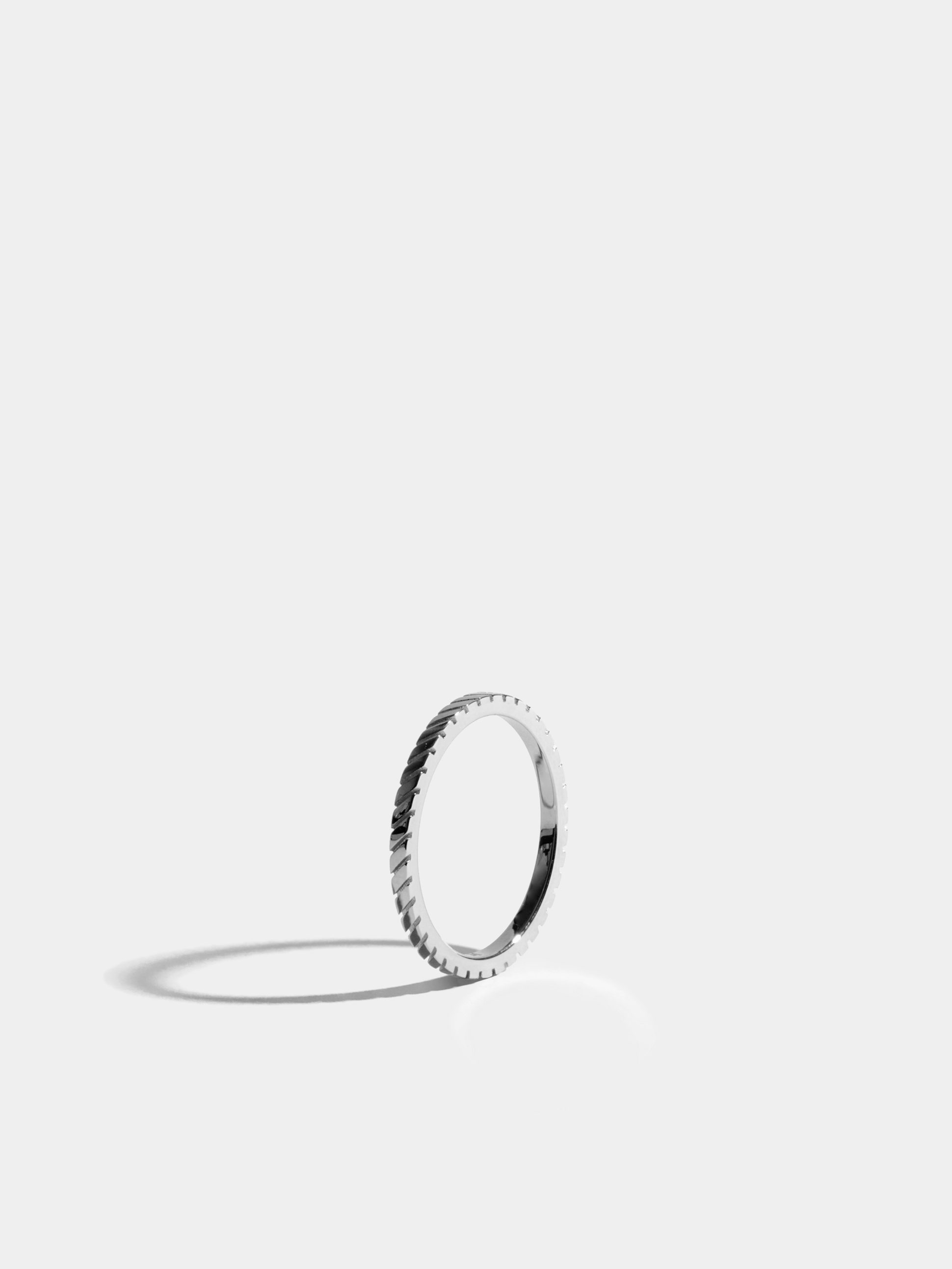 Anagramme grooved ring in 18k Fairmined ethical white gold