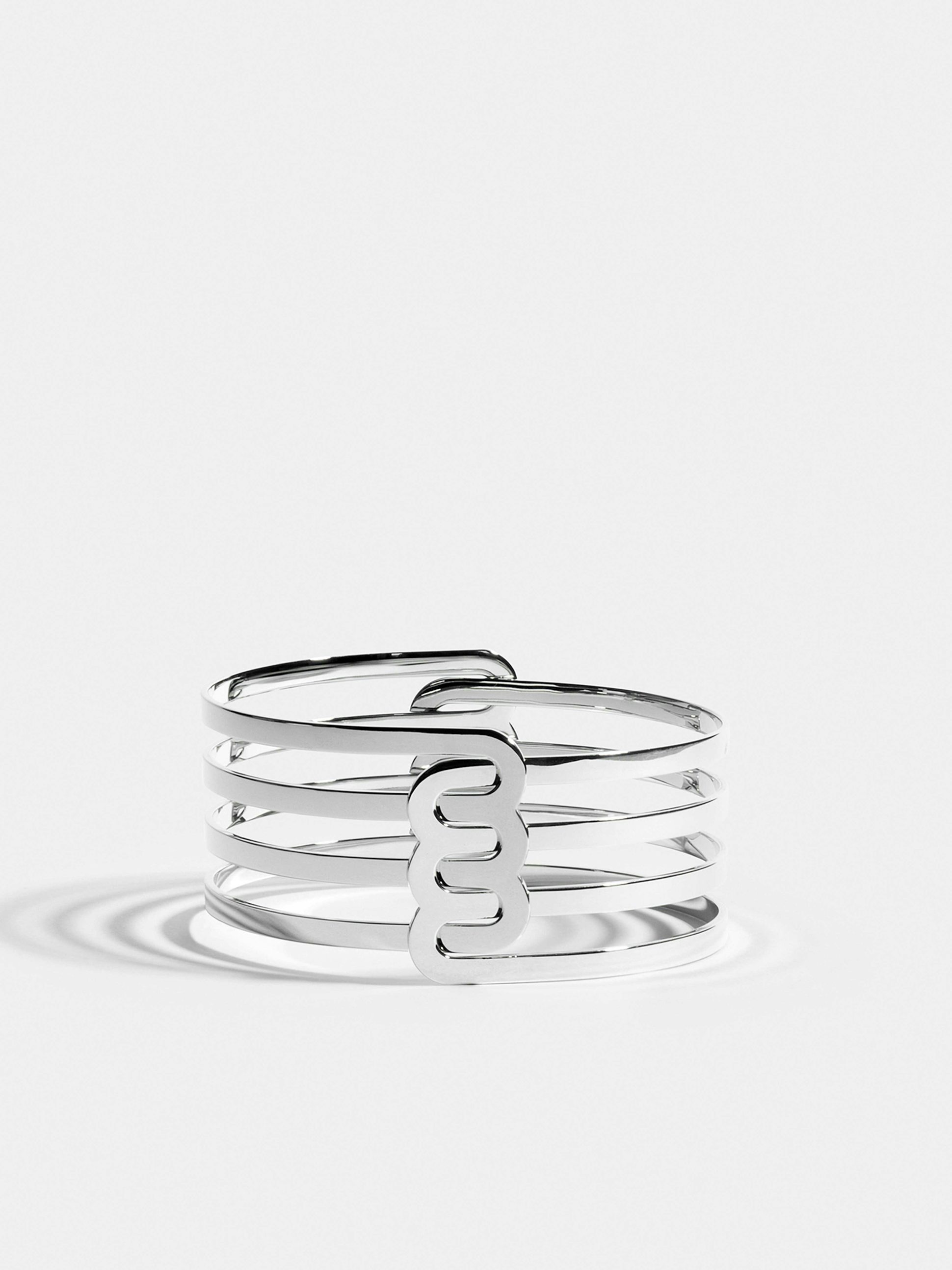 Bracelet Étreintes en Or blanc éthique 18 carats certifié Fairmined composé de deux demi-bracelets triples finition poli-brillant.