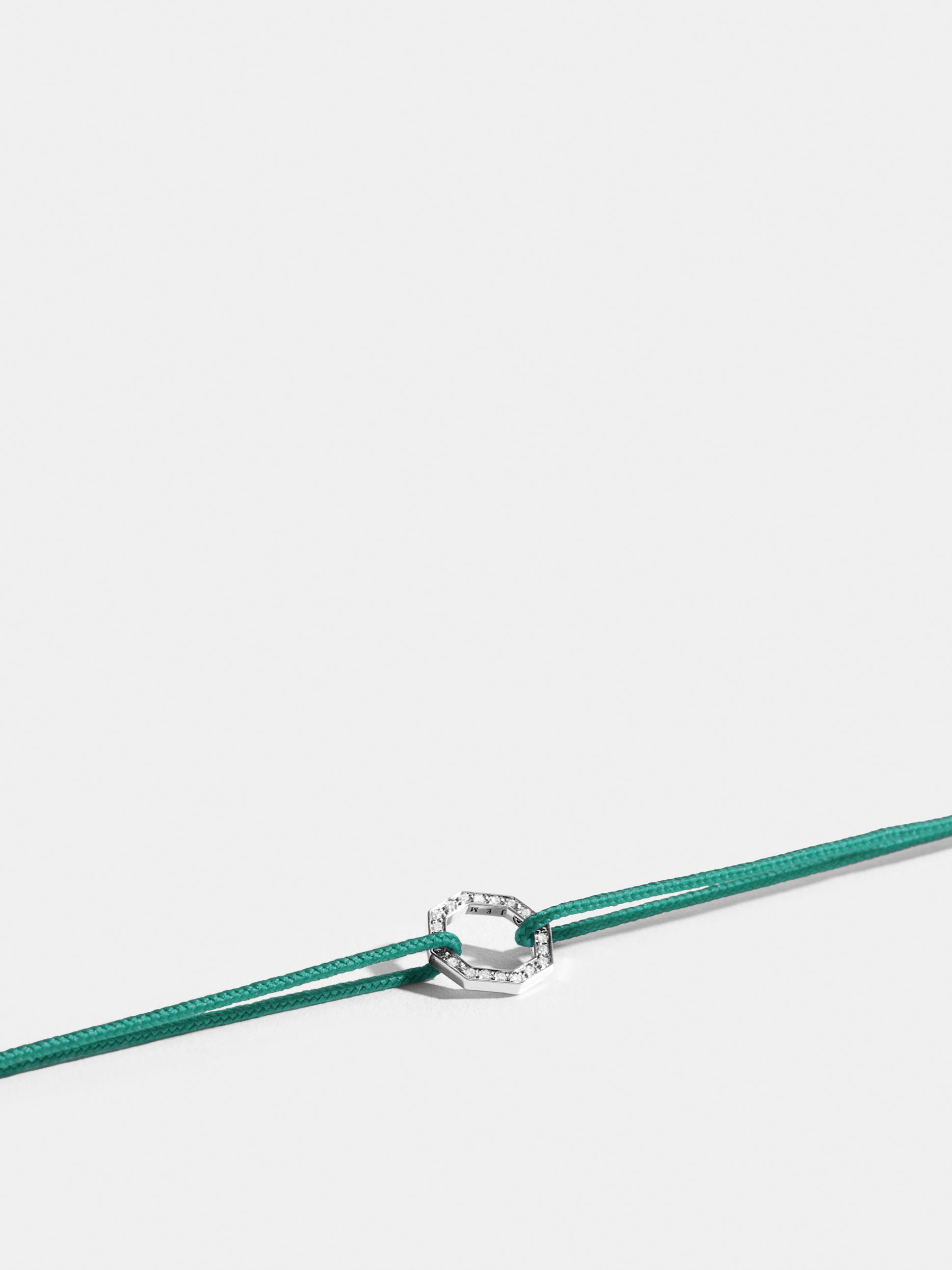 Octogone motif in 18k Fairmined ethical white gold, paved with lab-grown diamonds, on a turquoise blue cord.