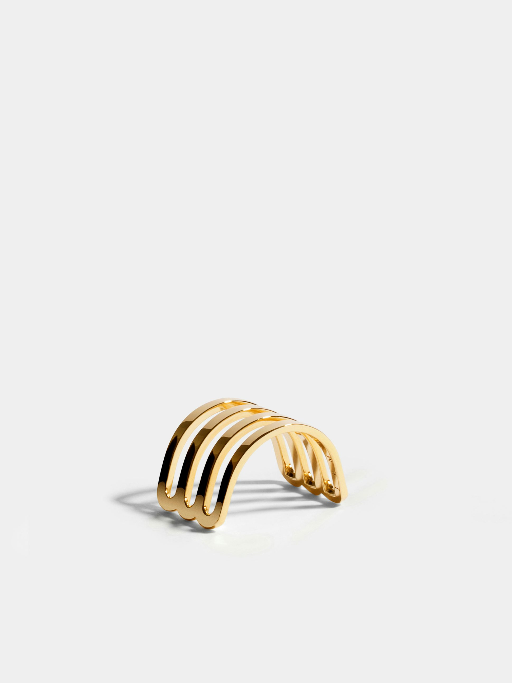 Étreintes triple half-ring in 18k Fairmined ethical yellow gold with a polished finish.