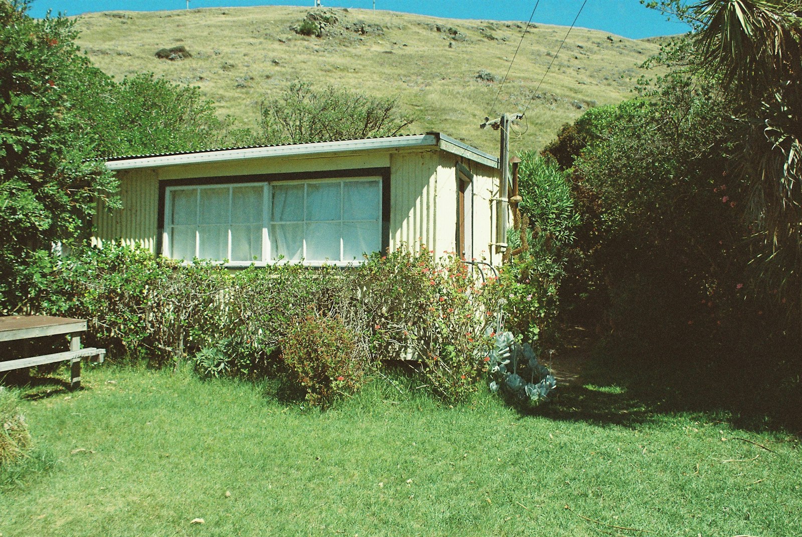 A Bach with a lawn out front