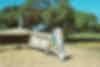 A towel hanging off some playground equipment 