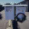 Two letterboxes, one with a wreath