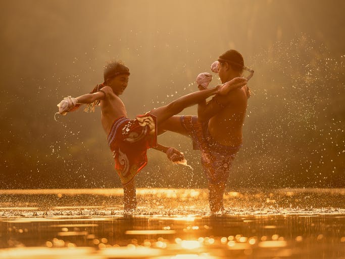 two kids fighting with text: words to ban from your dev team