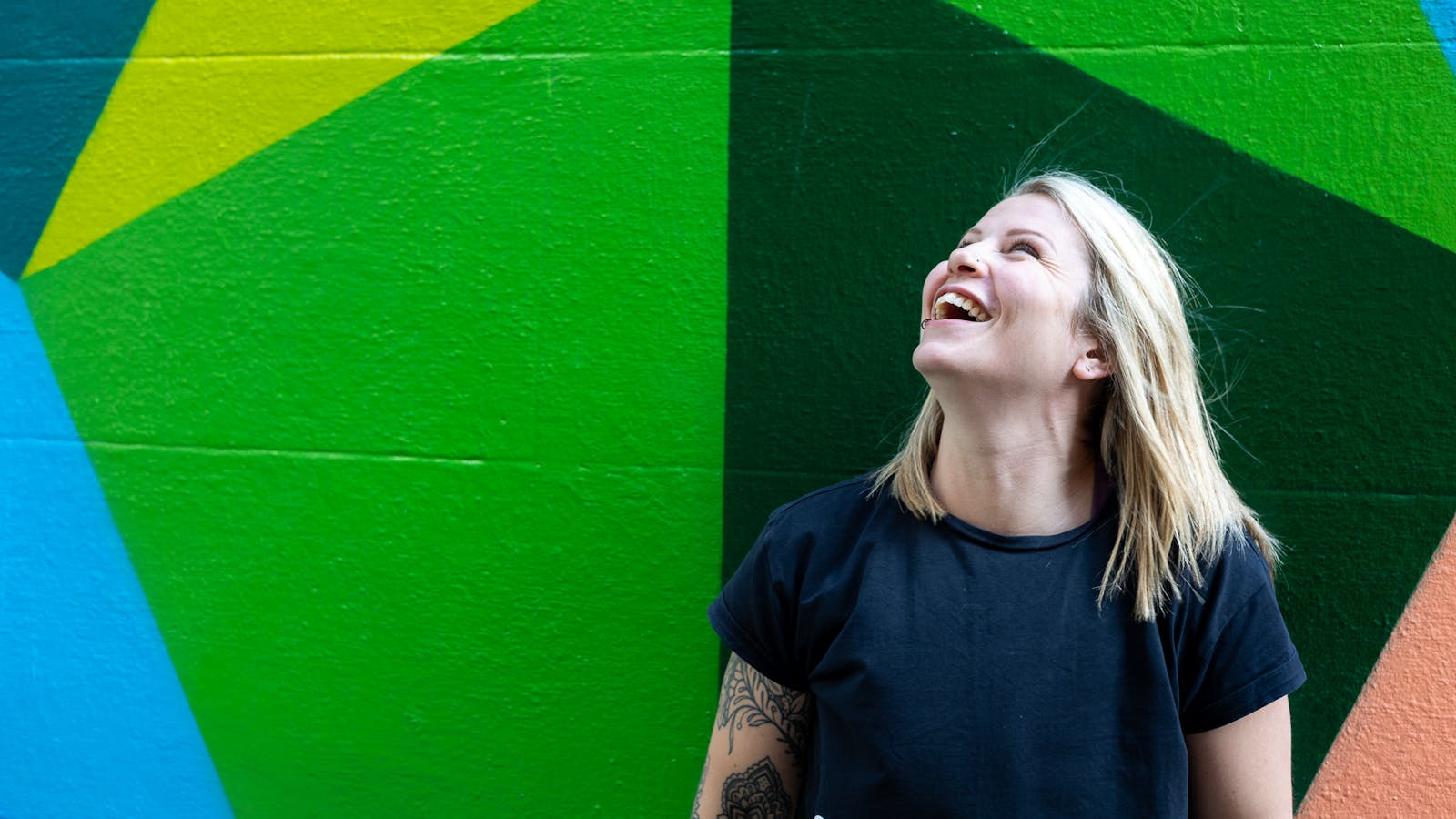 Jess from Jess-Fit standing in front of mural in Folkestone