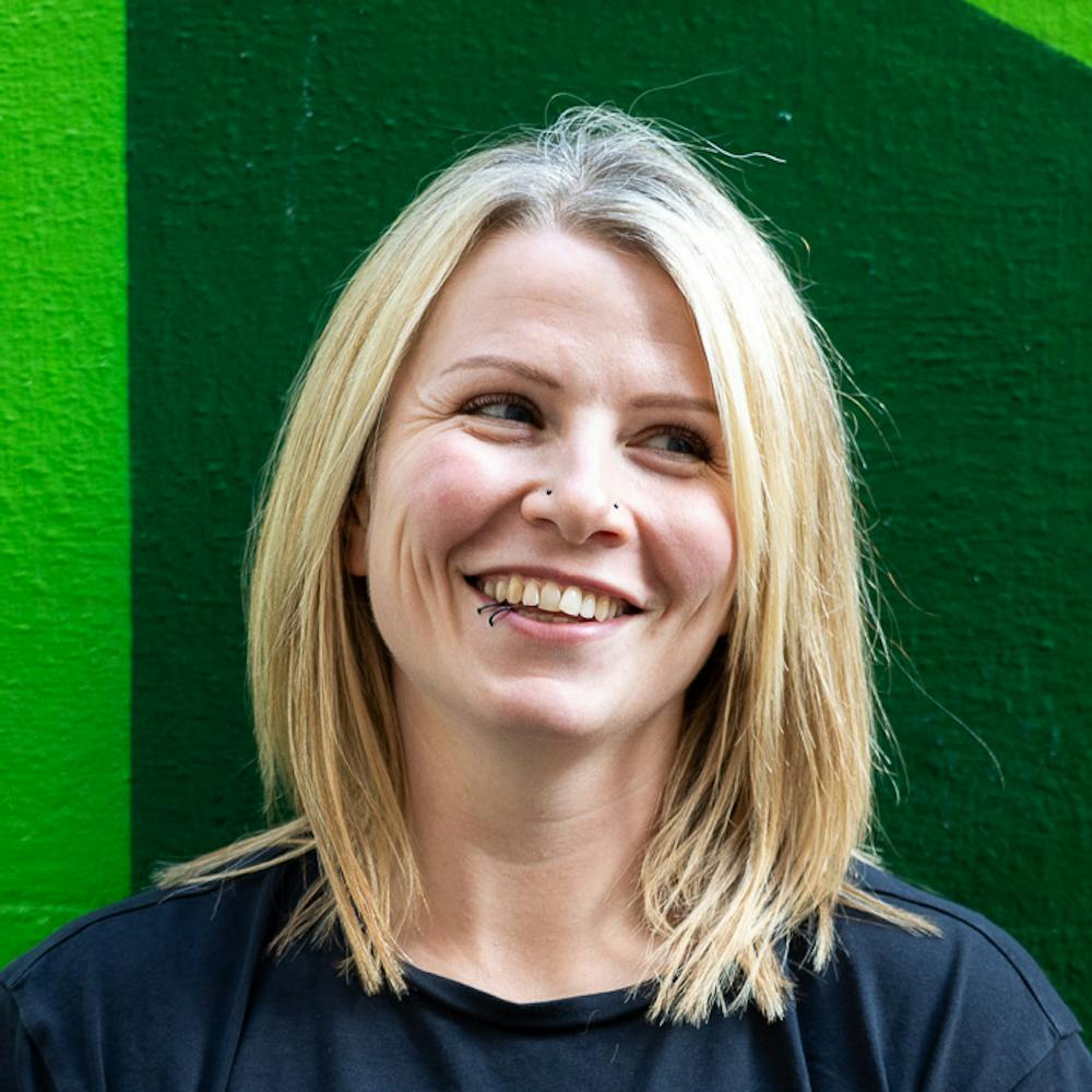 Jess from Jess-Fit standing in front of mural in Folkestone