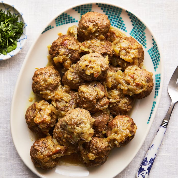 Meatballs with onion with fresh cilantro.