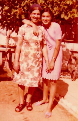 Esther with her youngest daughter and Arielle’s mother, Michal, in her backyard in Ashdod in 1973.