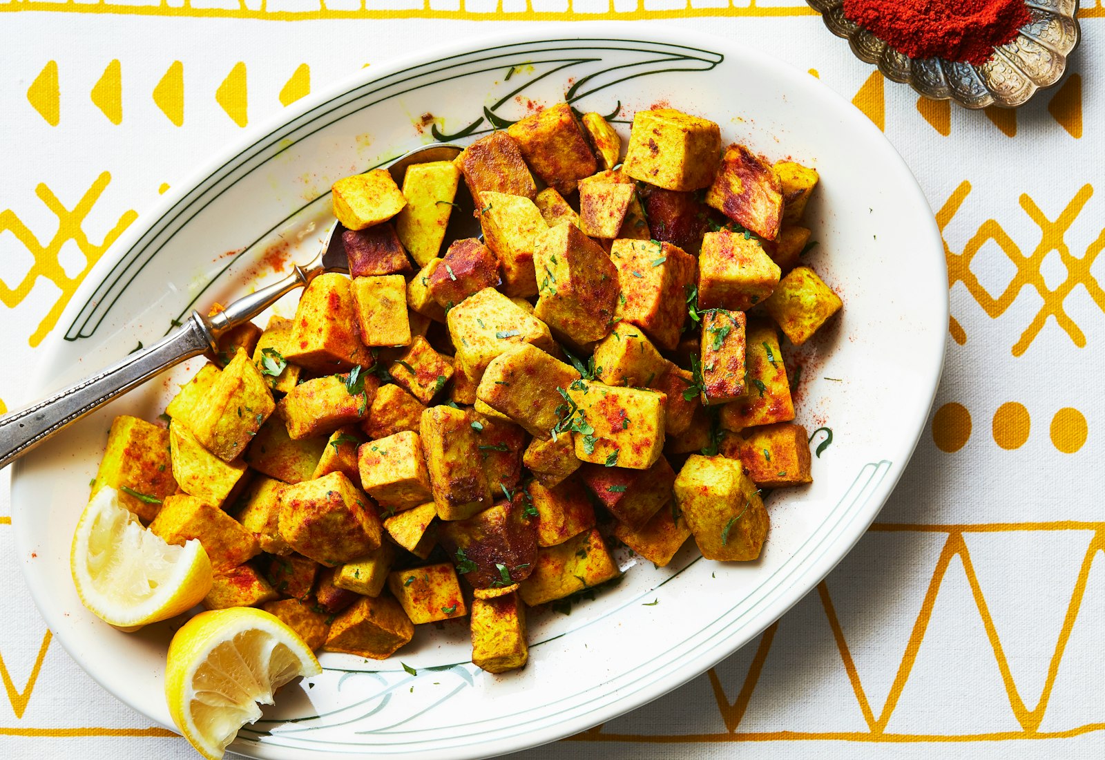 Cubed fried taro root on serving platter.
