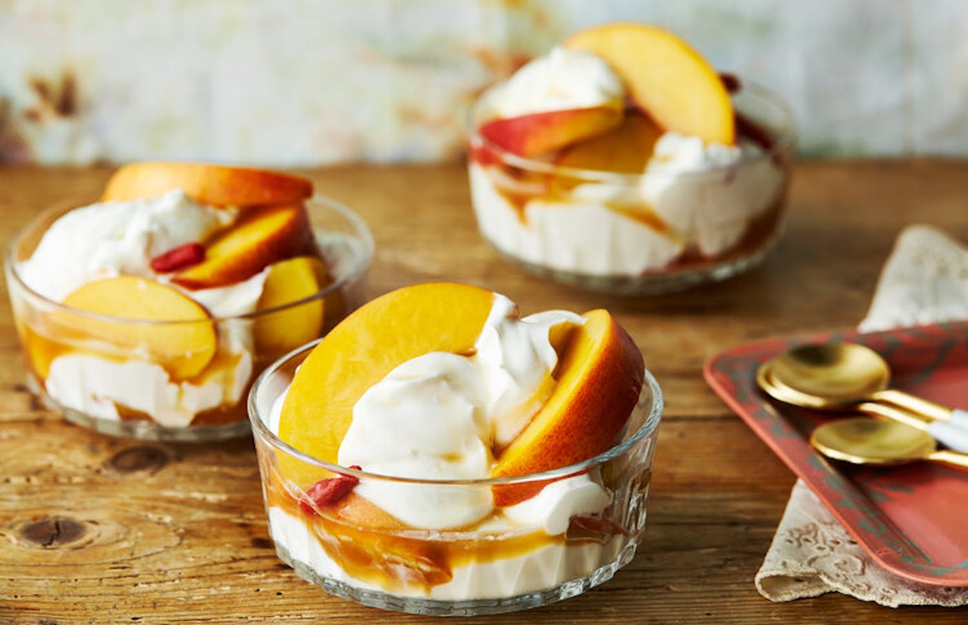 Pickled nectarines with their brine in bowls of thick vanilla yogurt 