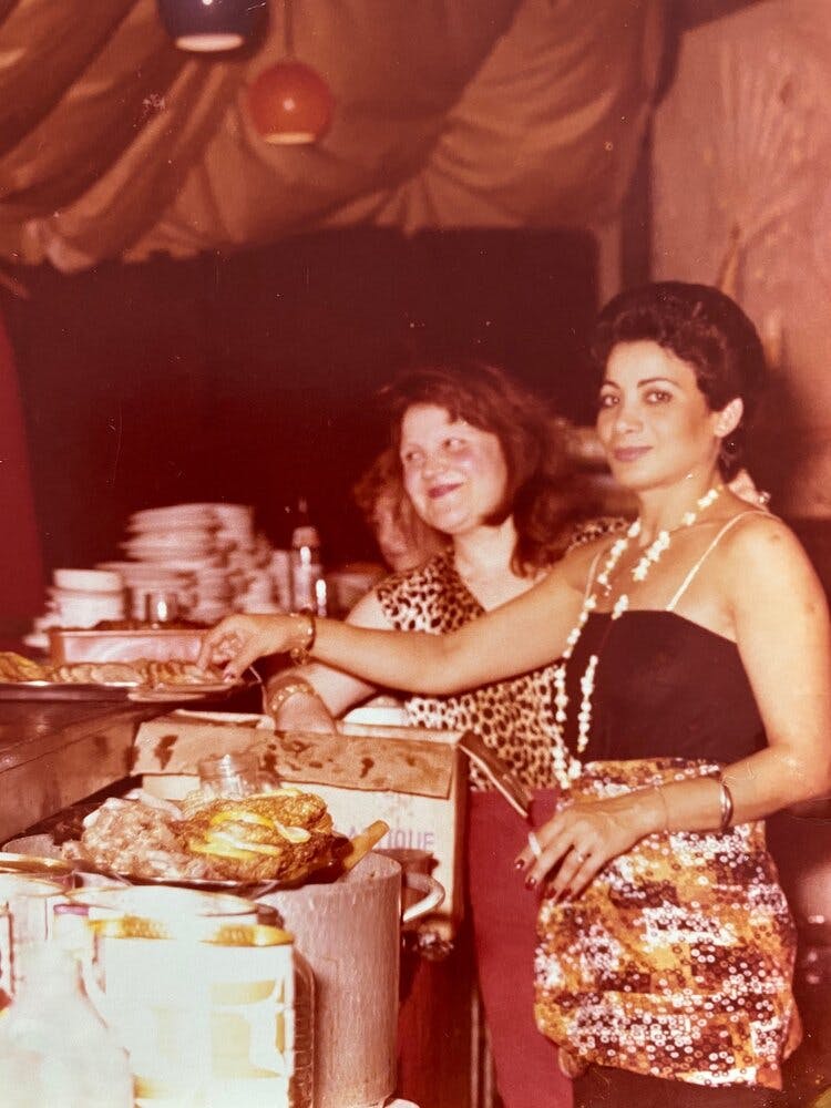 Ora catering a party in 1969. 