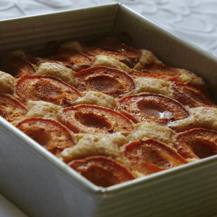 Spiced apricot cake in deep baking dish.