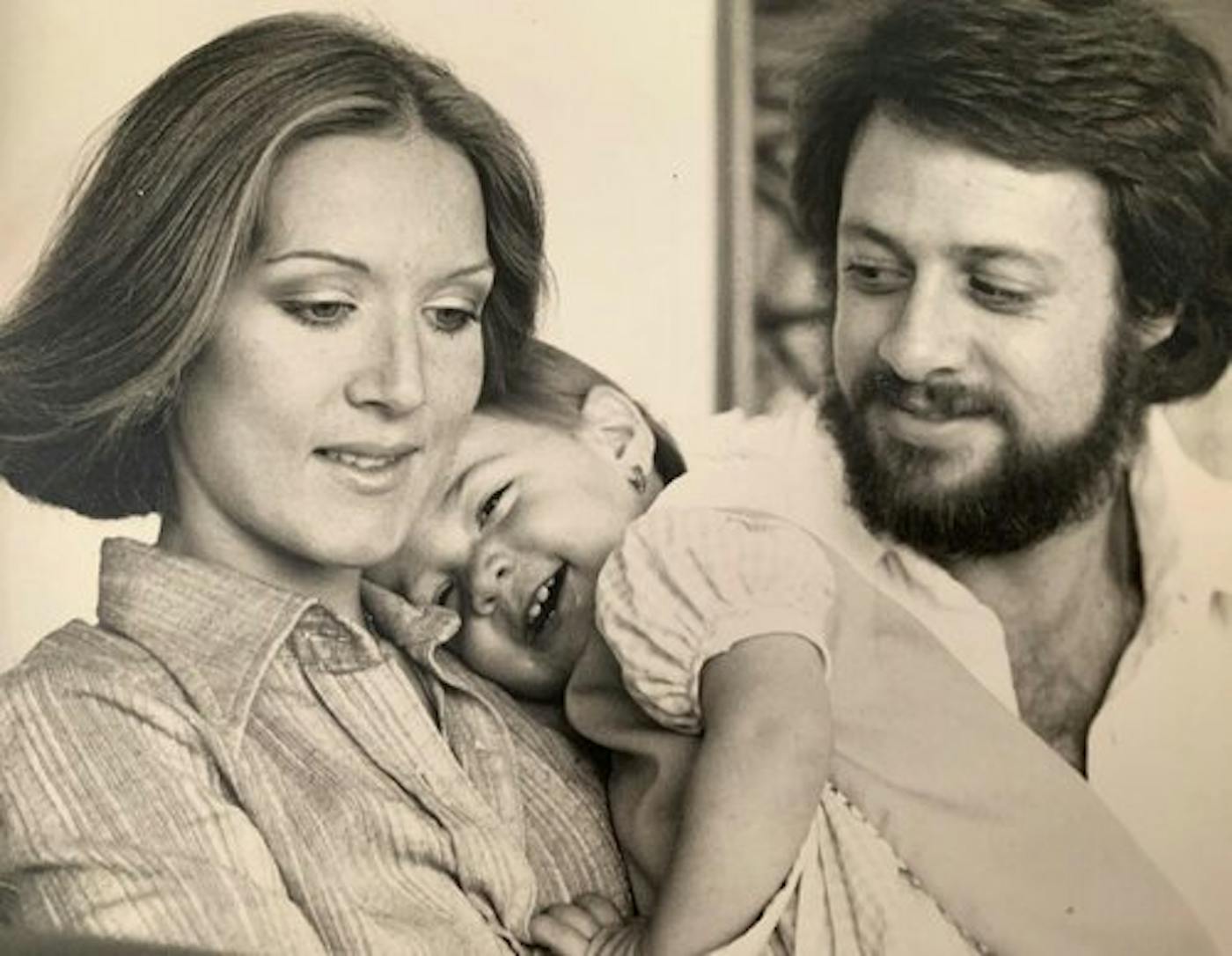 Monica with her parents