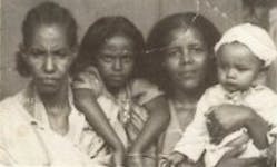 Left to right: Beejhy’s grandmother and Beejhy with her aunt and cousin in Sudan in 1983.