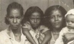Left to right: Beejhy’s grandmother and Beejhy with her aunt and cousin in Sudan in 1983.