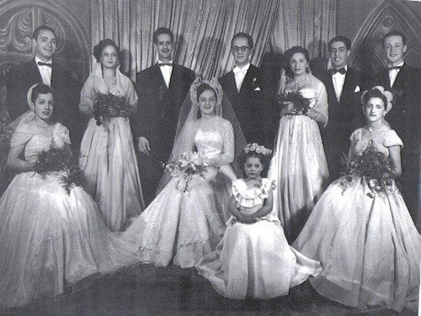 Ruth (center) on her wedding day with her family in 1950.