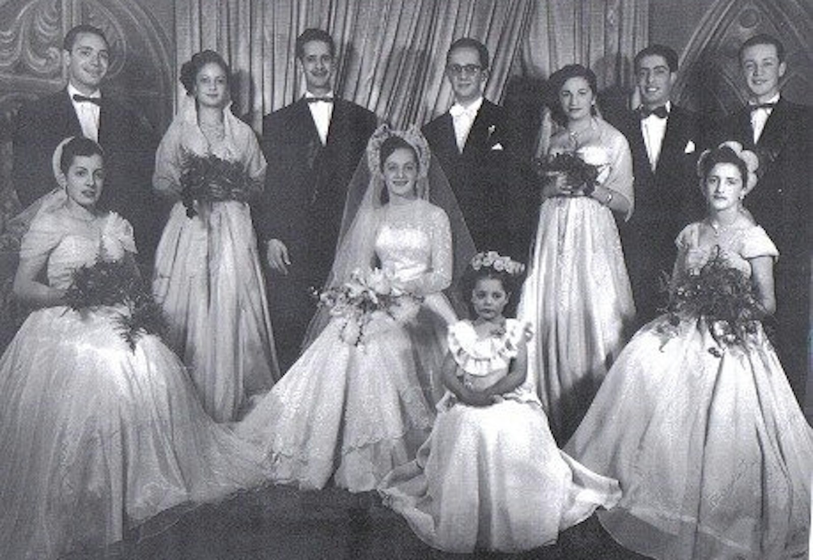 Ruth (center) on her wedding day with her family in 1950.