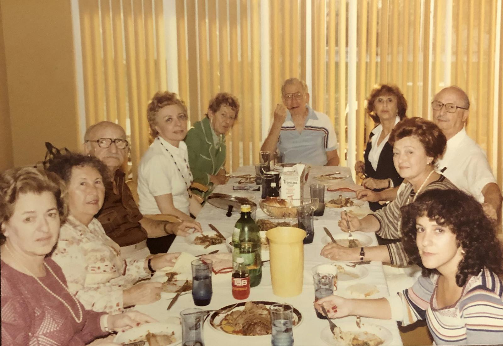 Genna's grandparents (second and third from left) with friends in 1984.