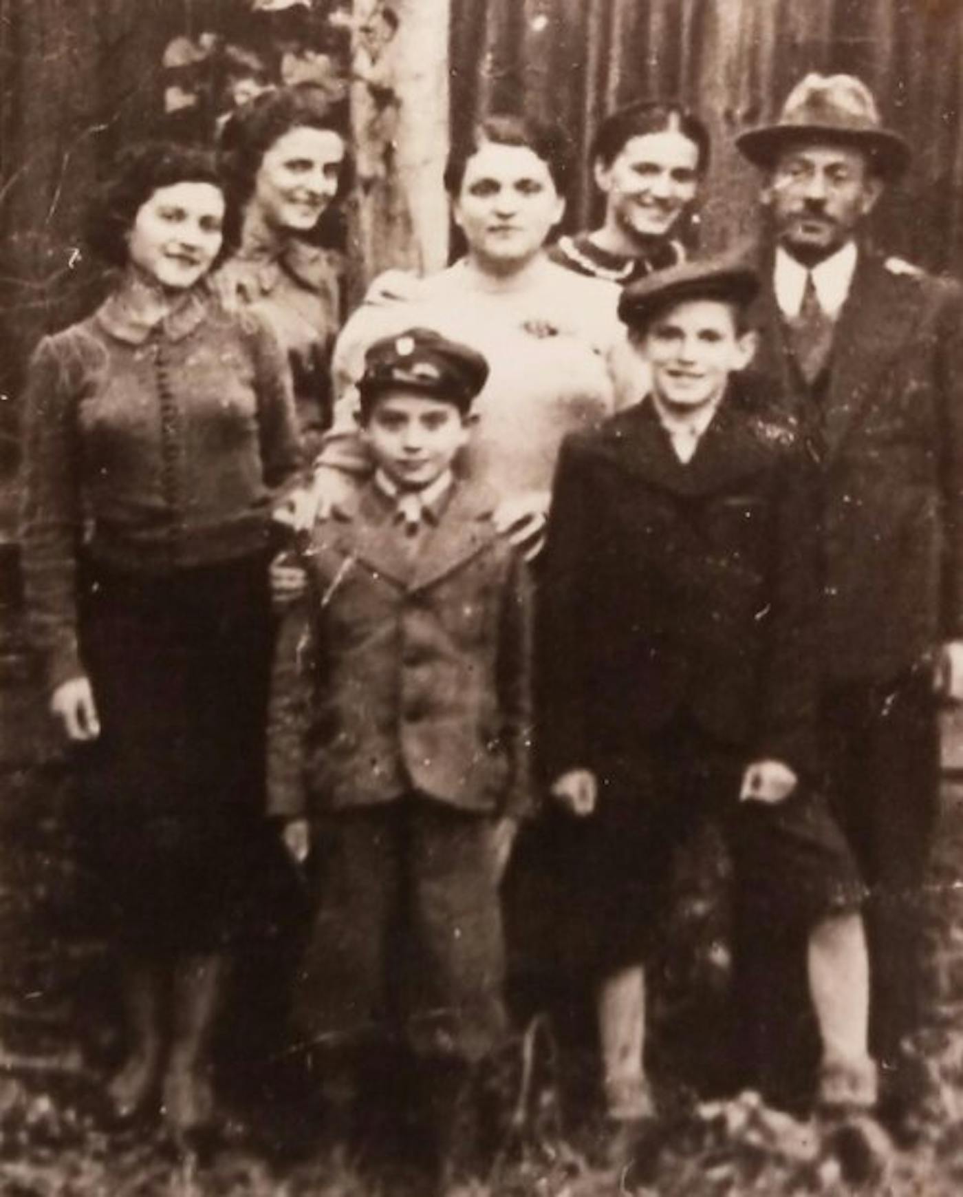 Rose and Helen (Left to right in the back row) and their mother Esther (center) in Prosczowice, Poland in 1938.