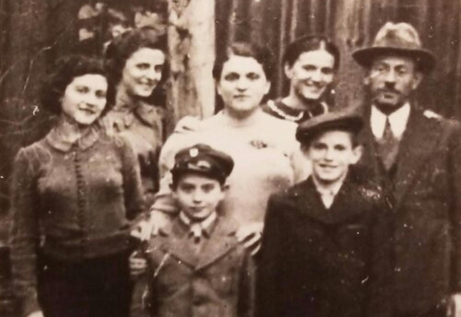 Rose and Helen (Left to right in the back row) and their mother Esther (center) in Prosczowice, Poland in 1938.