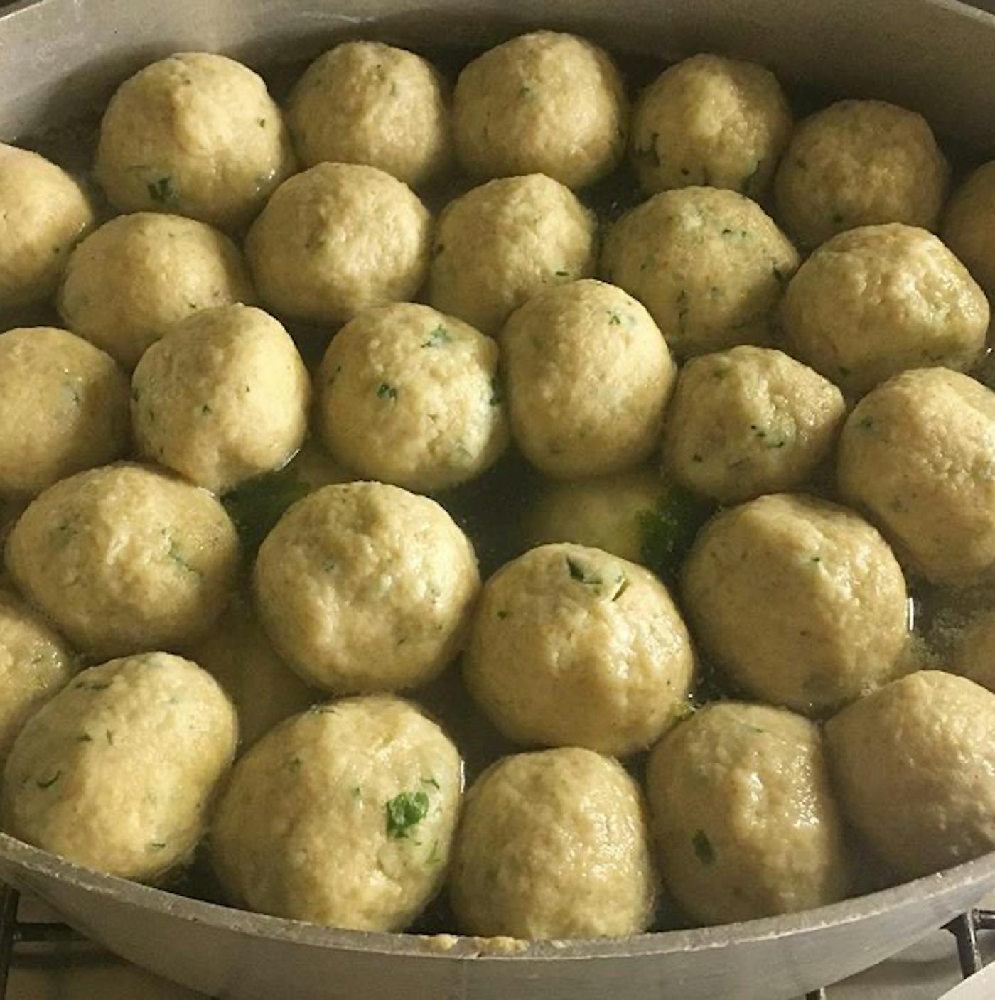 Cneidalaj cooking in heavy pot.