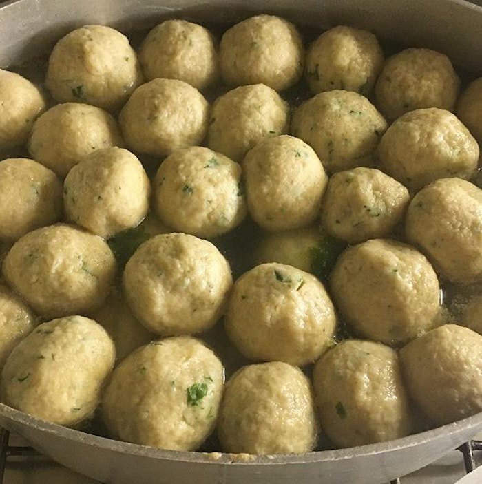 Cneidalaj cooking in heavy pot.