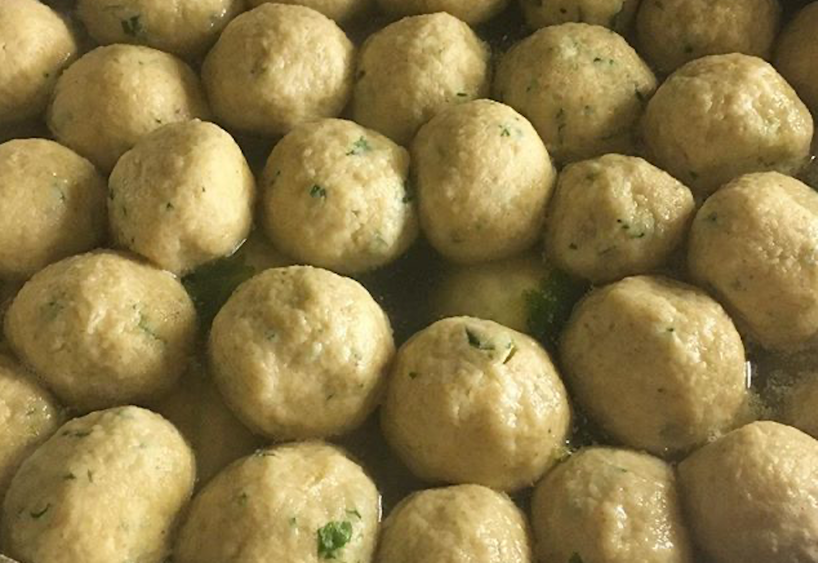 Cneidalaj cooking in heavy pot.