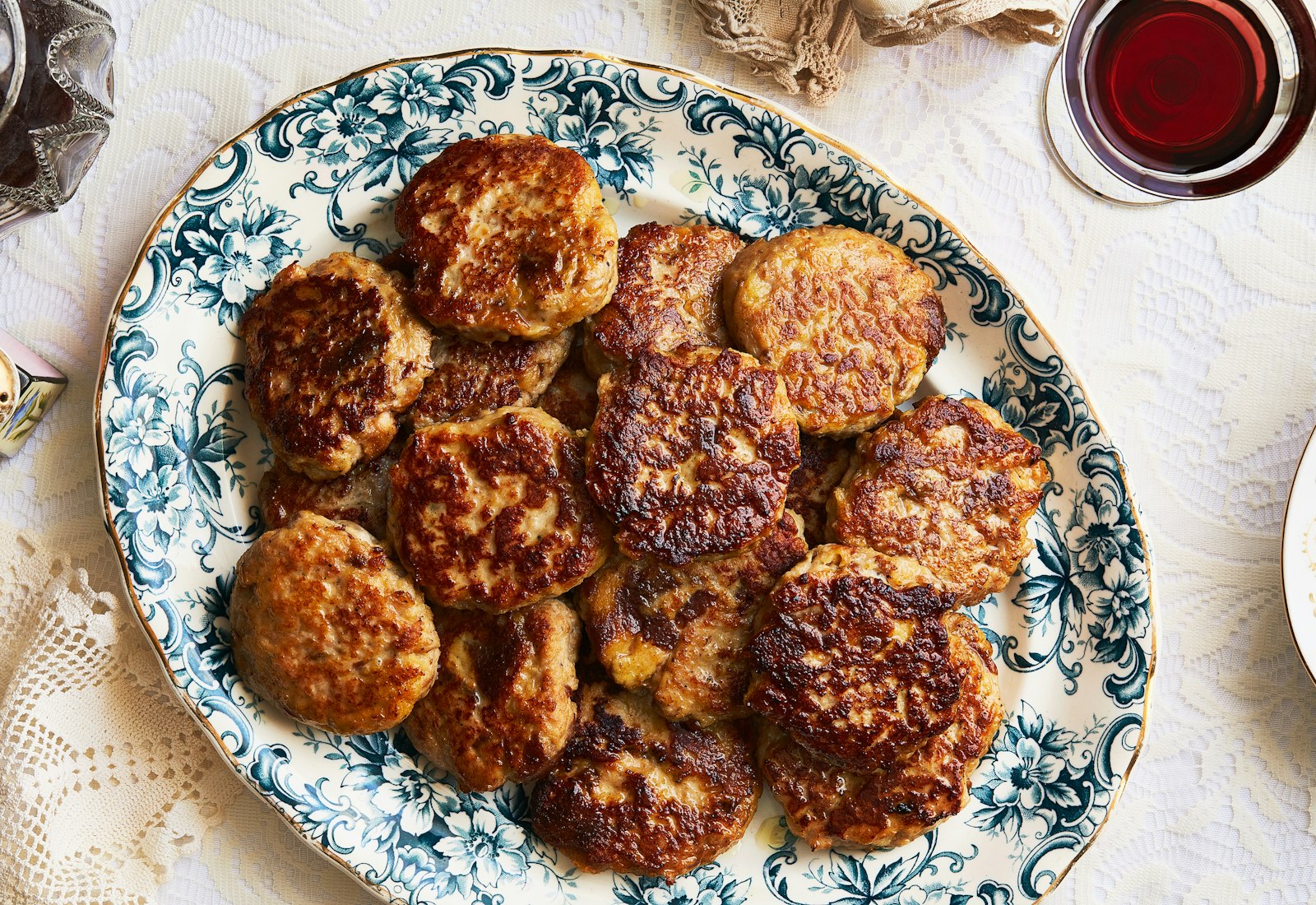 Fasirt on a teal and white serving platter.