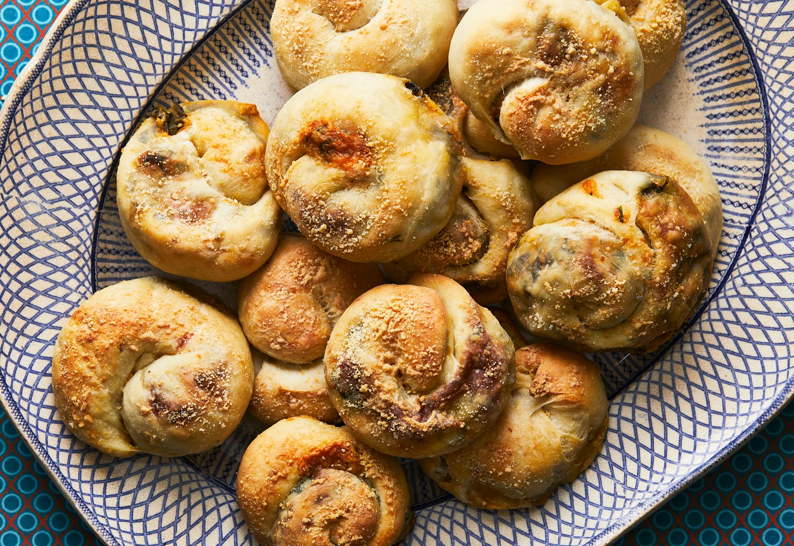 Up-close image of boyos on blue and white serving platter.
