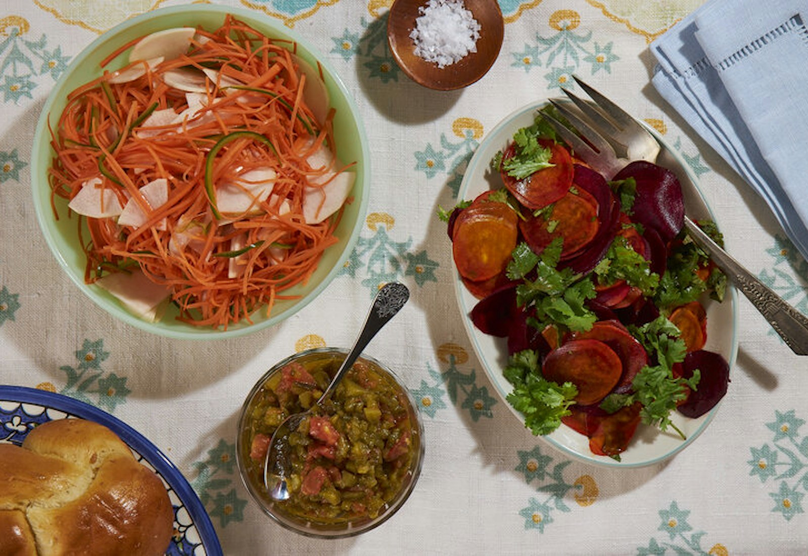 Mseir with beet salad and slata mechouia, challah and coarse salt.