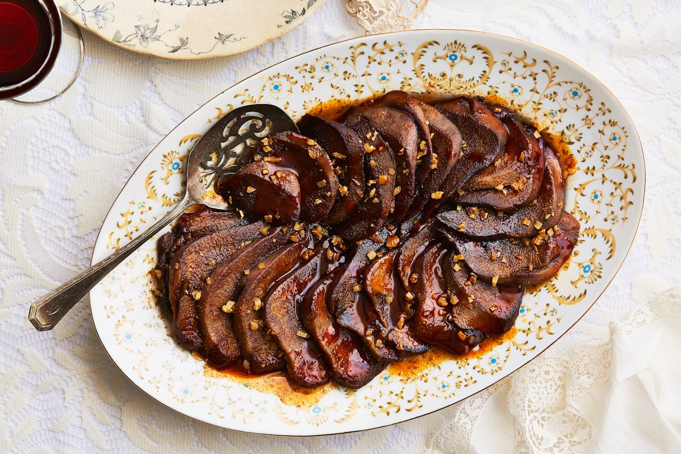 Seared beef tongue on serving platter.