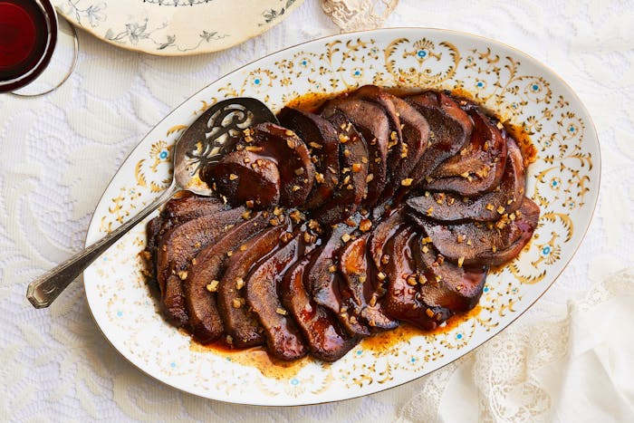 Seared beef tongue on serving platter.