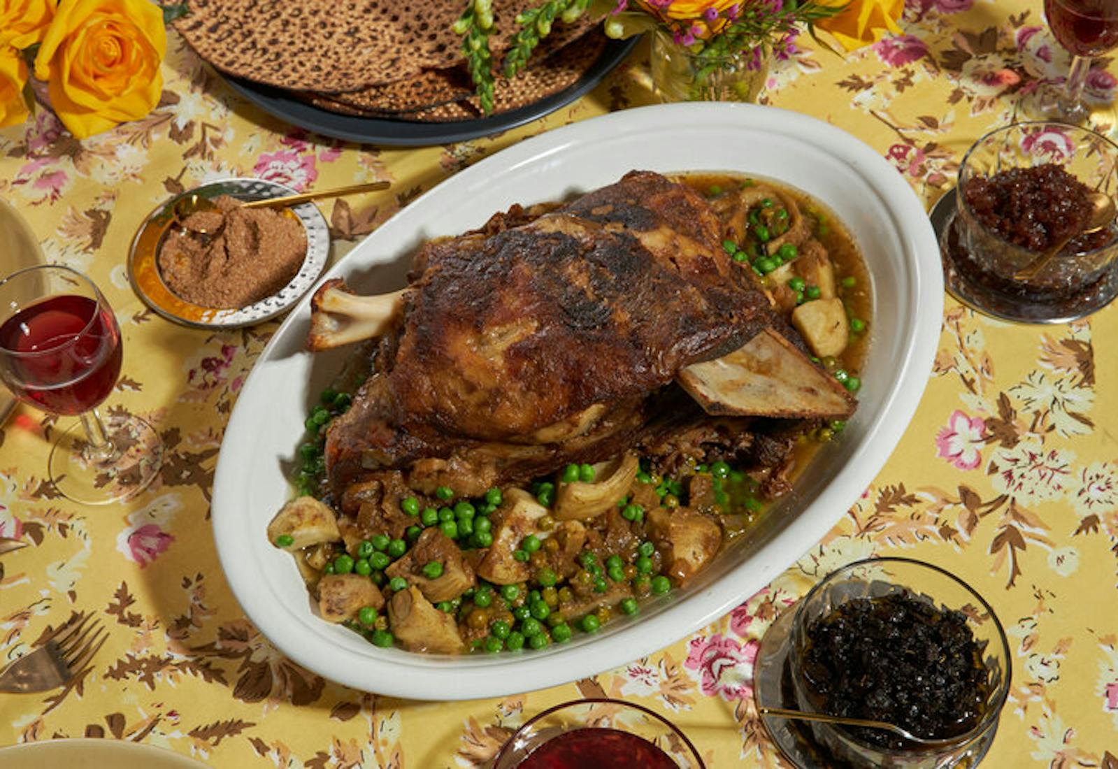 Braised lamb with sides of spices, chopped olives, confit red onions and pomegranate jam.